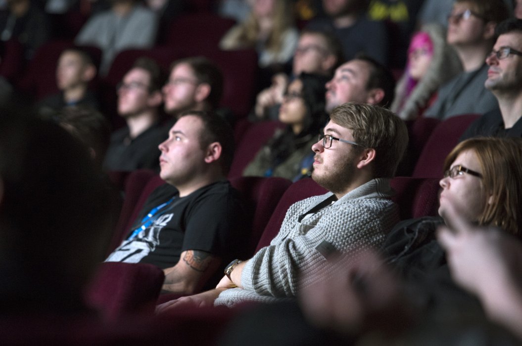 Image shows audience members looking at the screen during a Pictureville Cinema event
