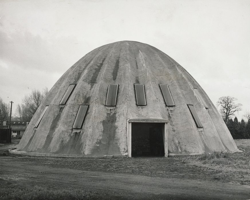 Large dome-shaped building square door at front