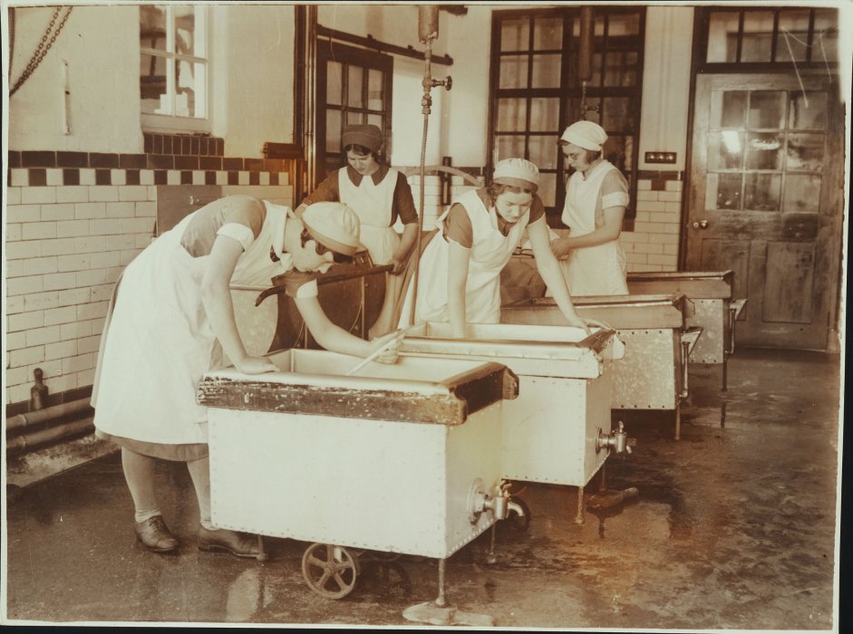 Female students making butter and cheese
