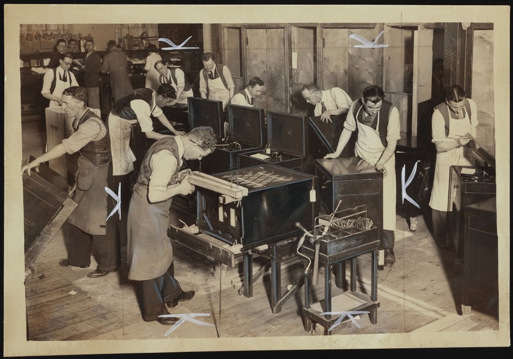 Factory workers producing records