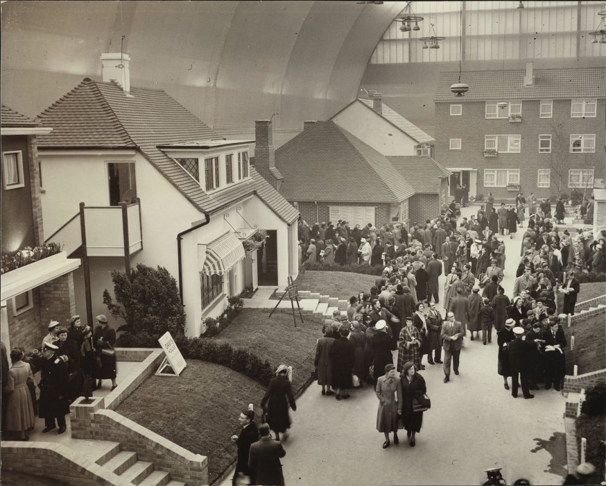 Crowds exploring show homes at the Ideal Home Exhibition, 1955