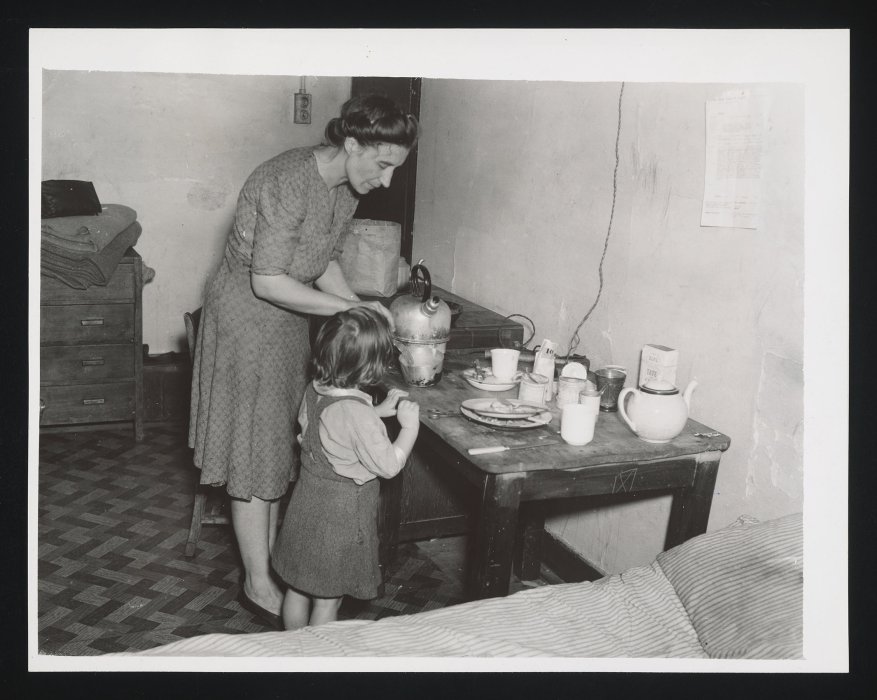 Woman and girl making tea