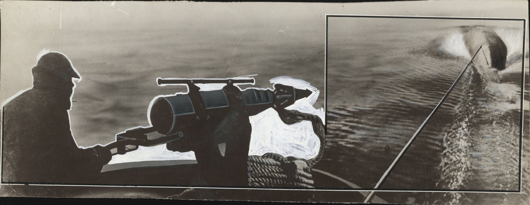 Man operating harpoon gun on board ship