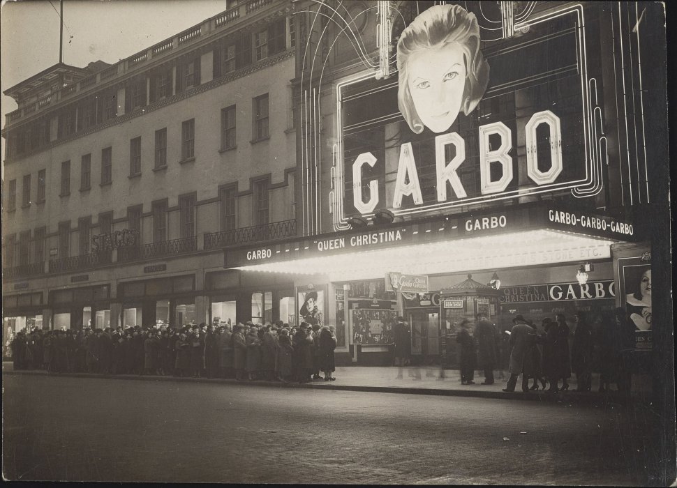 A crowd queues at the Empire Cinema to see Greta Garbo in Queen Christina